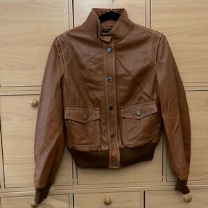 Woman or man . Unisex leather jacket .